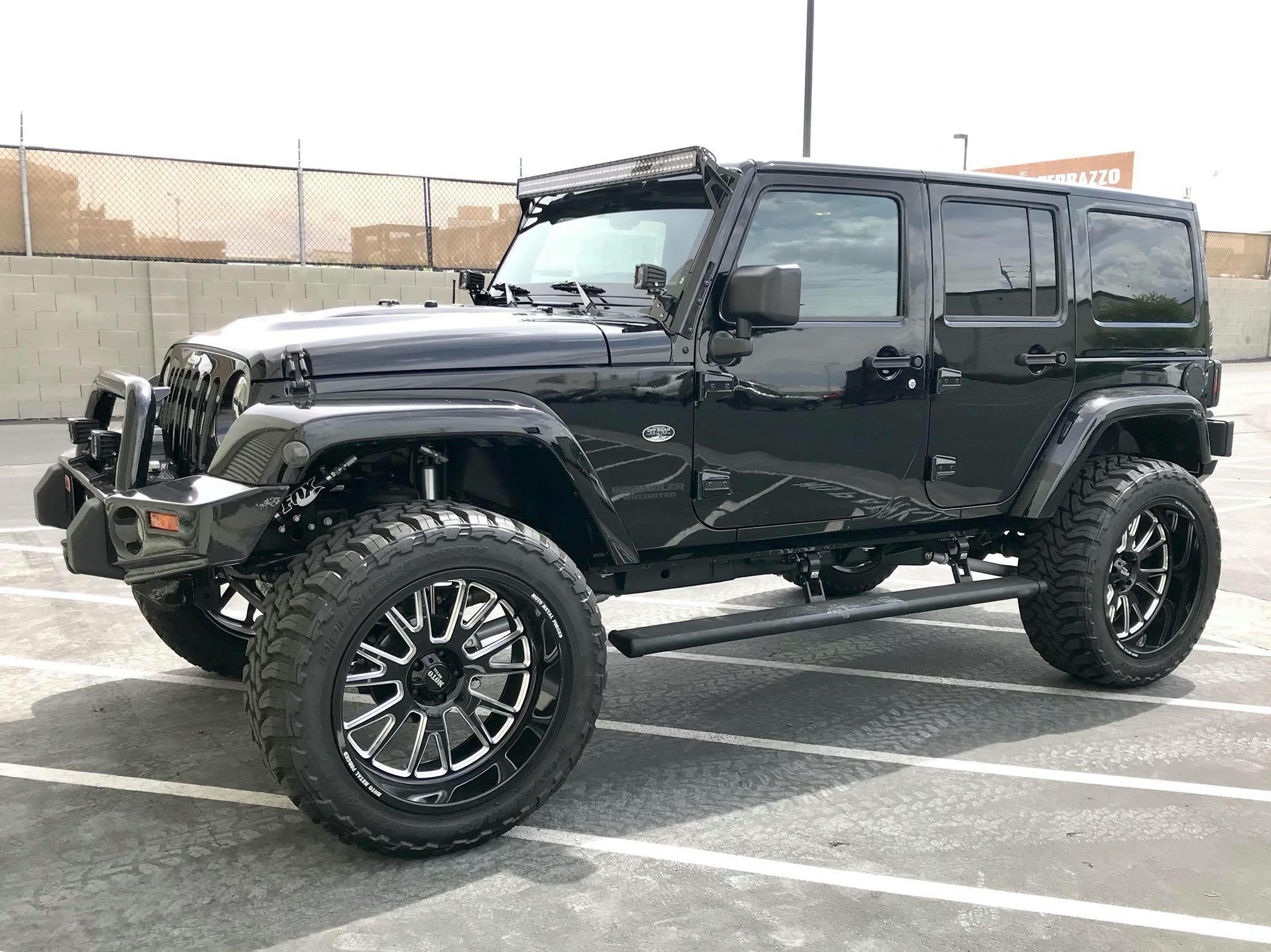 lifted JK Wrangler 2014 Dune color with Atlas bumpers from DSI